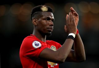 Paul Pogba sported black and white tape