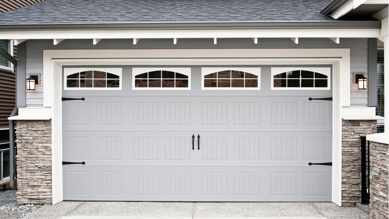 Gray garage door with windows