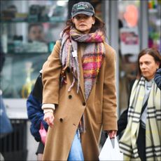 Katie Holmes in a Camel Coat, colorful plaid scarf, jeans