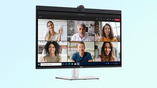 dell ultrasharp 4k video conferencing monitor on blue background