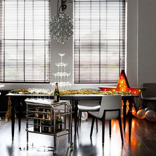 black white and gold festive fun dining room