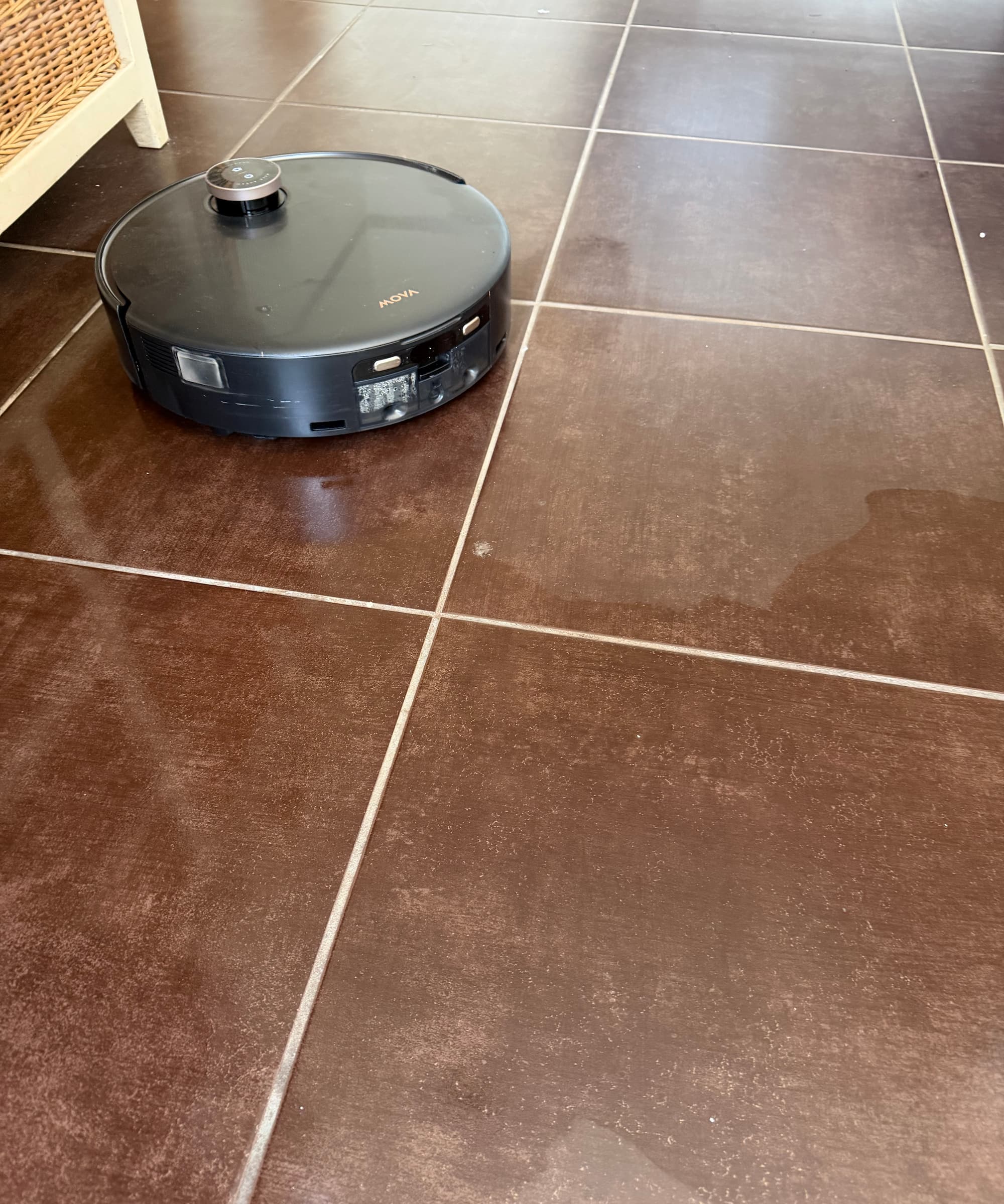 The MOVA vacuum/mop mops the bathroom floor