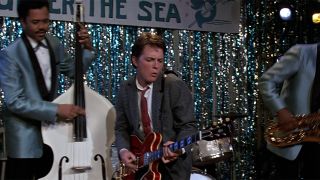 Michael J. Fox as Marty McFly playing Johnny B Goode on the guitar at the Under The Sea dance in Back To The Future