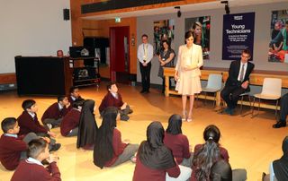 meghan markle sneak school visit national theatre