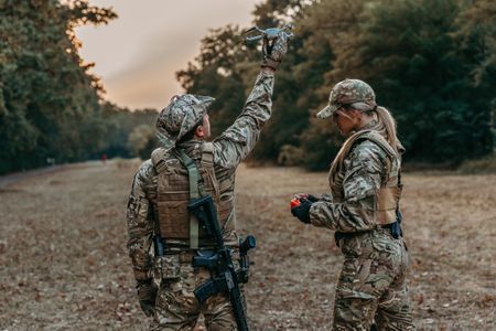 Soldiers operating surveillance drone