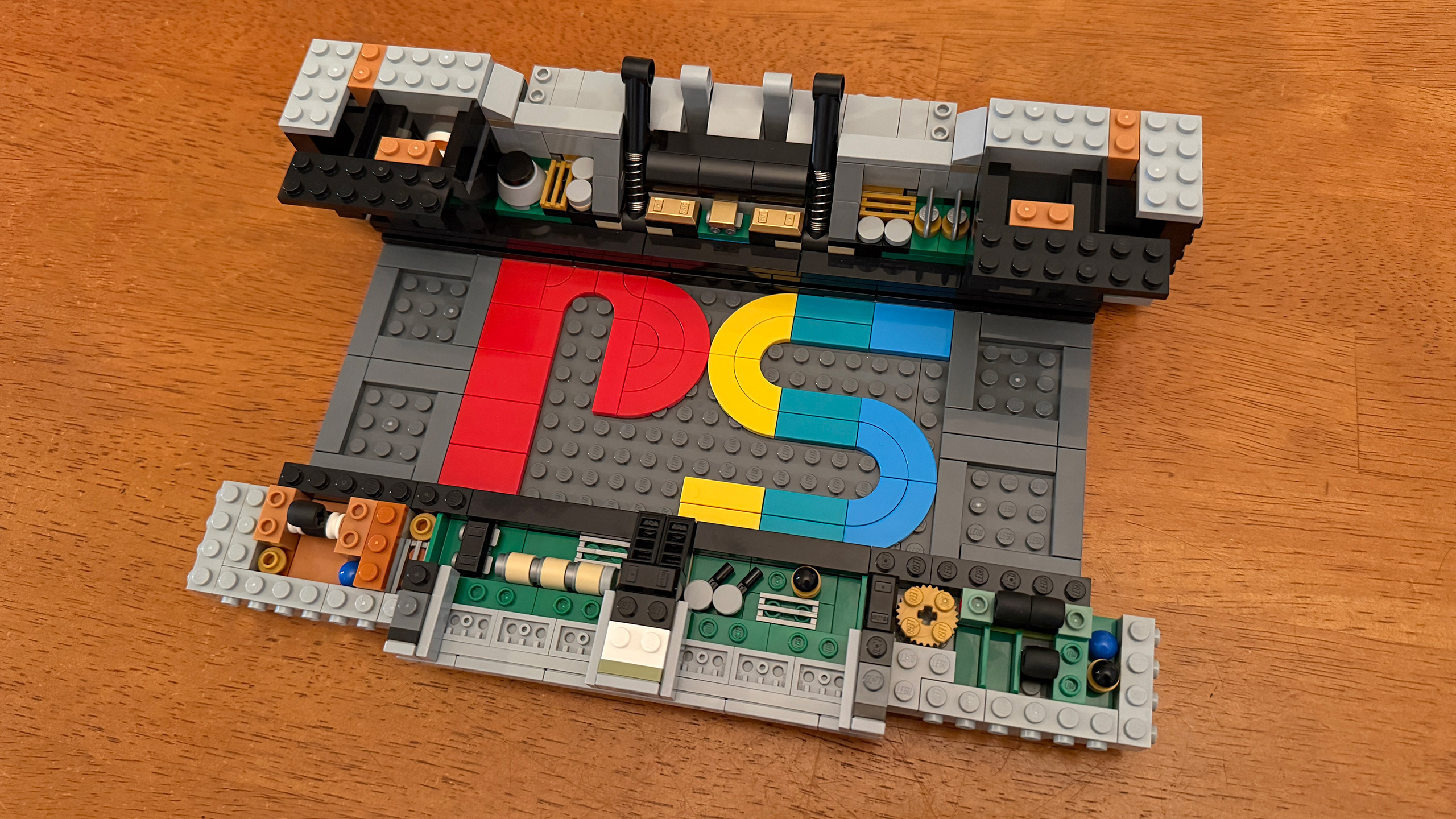 Structure inside the Lego PlayStation #72306 showing the PS logo and circuit boards