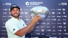 Marco Penge holds the Danish Golf Championship trophy