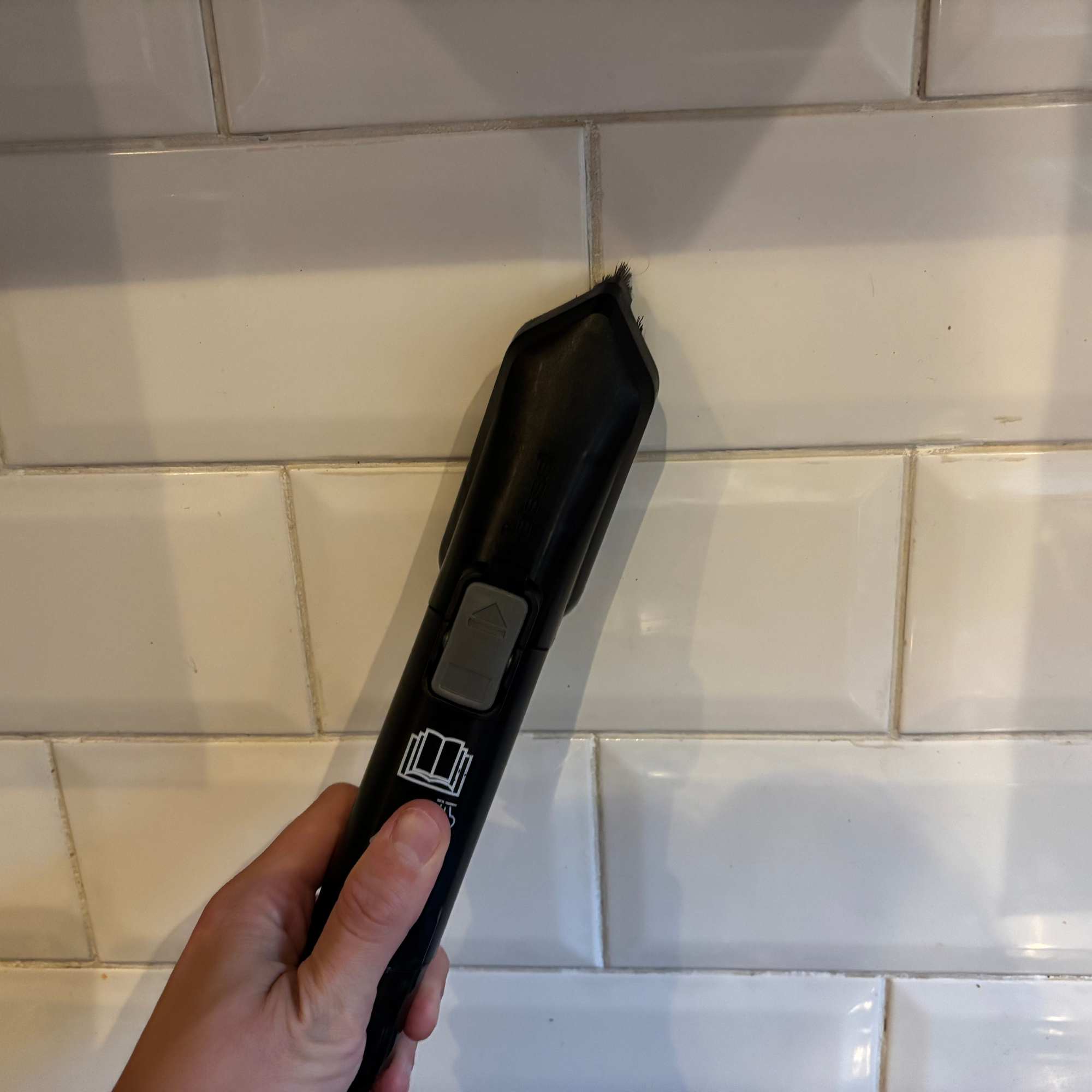 Using the Bissell SpotClean HydroSteam to clean tiles