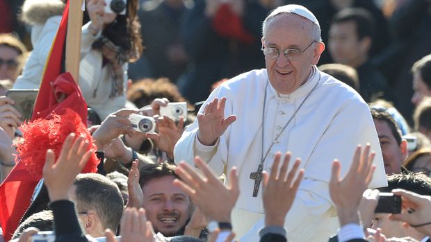 Pope Francis waves to the crowd from the papamobile during his inauguration mass at St Peter&amp;#039;s square on March 19, 2013 at the Vatican. World leaders flew in for Pope Francis&amp;#039;s inauguration m