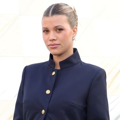 Sofia Richie Grainge debuted her growing baby bump under the military jacket trend