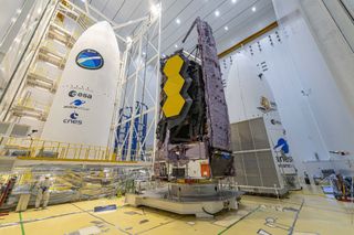 The James Webb Space Telescope folded up for launch before it was encapsulated in the fairing of an Ariane 5 rocket.