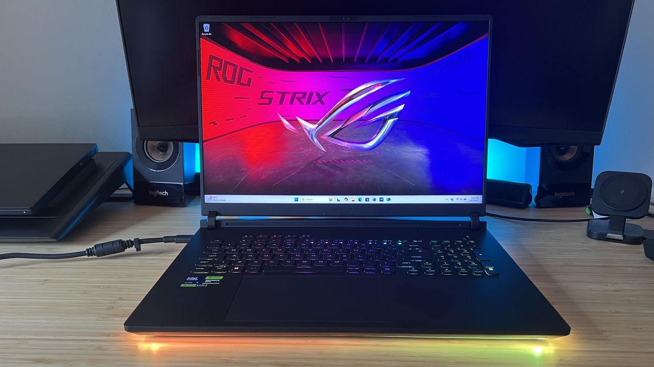 Asus ROG Strix Scar 18 2025 gaming laptop on a wooden desk