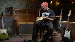 Carlos O'Connell checking Rory Gallagher's 1961 Strat