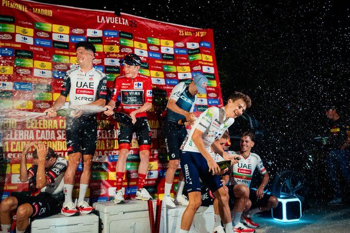 Jonas Vingegaard celebrates victory at the 2025 Vuelta during an improvised podium ceremony 