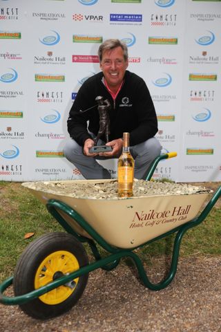 Winner, Barry Lane, with the spoils of victory