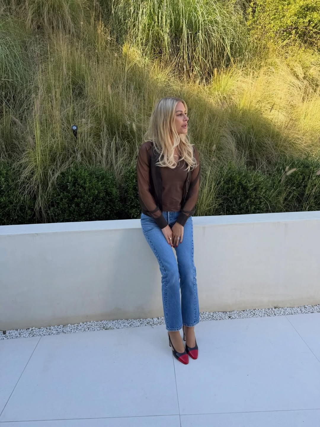 morgan stewart wearing a pair of slim-straight jeans