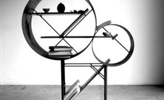 Meet my Project' shelf by Takuya Hamajima. Shelving made of two circles on a square base.