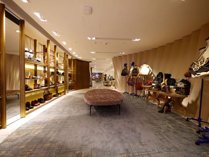 Champagne and shoes: Luxury stores adapt to changing shopper