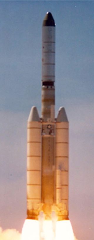 A Titan 3D rocket equipped with five-segment solid rocket boosters launches the spy satellite Hexagon Mission 1215 on March 16, 1979 from Vandenberg Air Force Base, Calif., in this National Reconnaissance Office image.