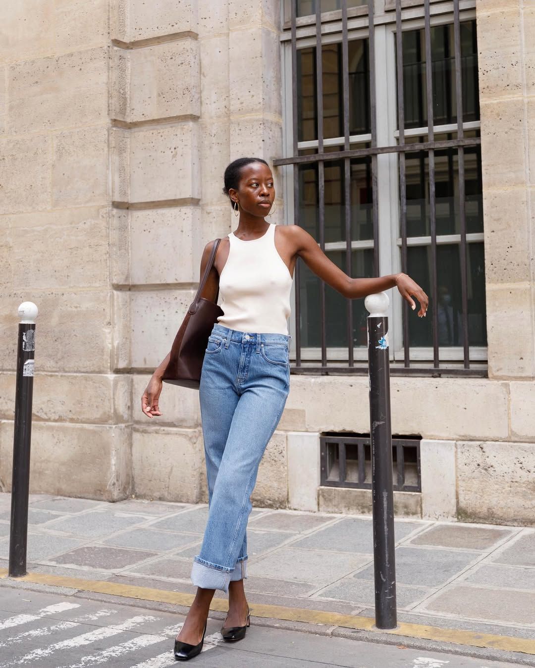 @sylviemus wearing cuffed jeans and tank