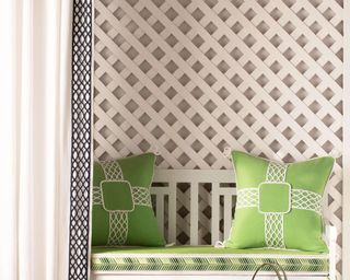 Samuel and Sons trellis trimmings on green fabric with trellis design background