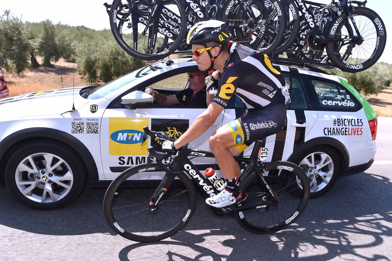 Kristian Sbaragli collects some bidons