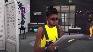 A Sim uses a tablet in The Sims 4 Businesses and Hobbies