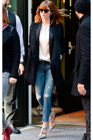 Emma Stone combines smart with casual pieces