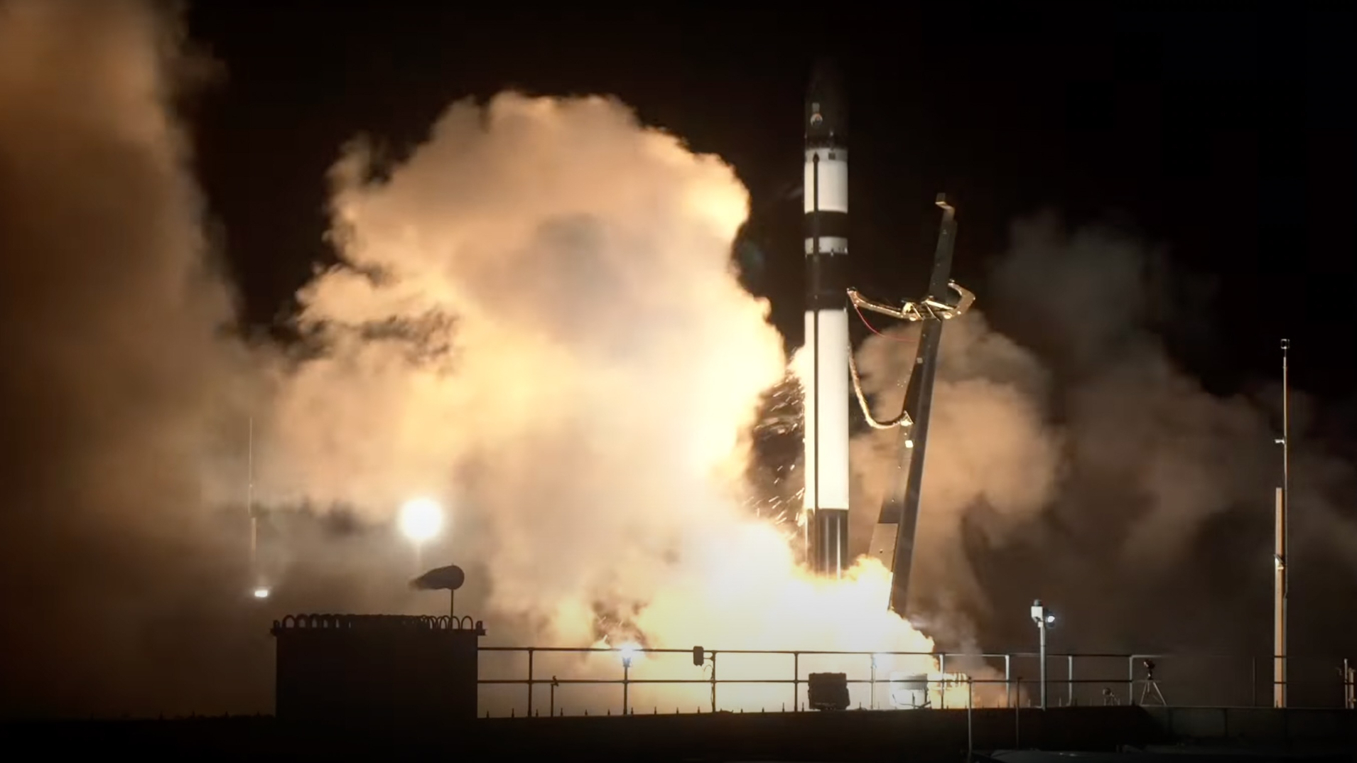 A Rocket Lab Electron rocket launches the &quot;Mountain God Guards&quot; mission for the Japanese company iQPS from New Zealand on June 11, 2025.