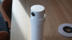 Logitech's Sight camera tower on a desk