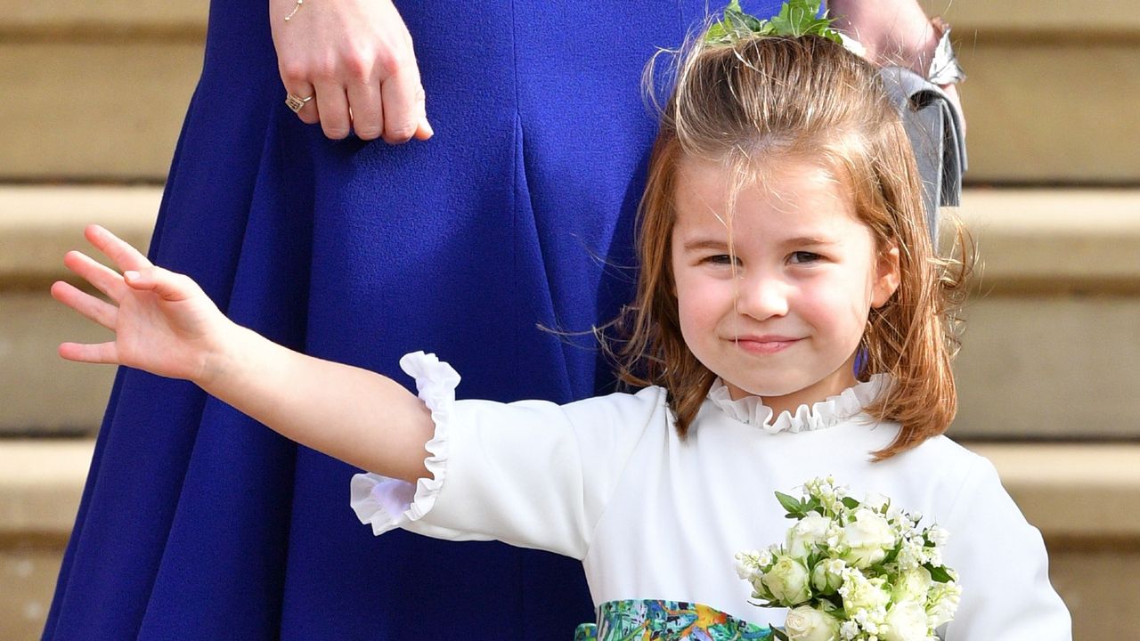 Princess Charlotte of Cambridge attends the wedding of Princess Eugenie of York and Jack Brooksbank at St George&#039;s Chapel on October 12, 2018 in Windsor, England.