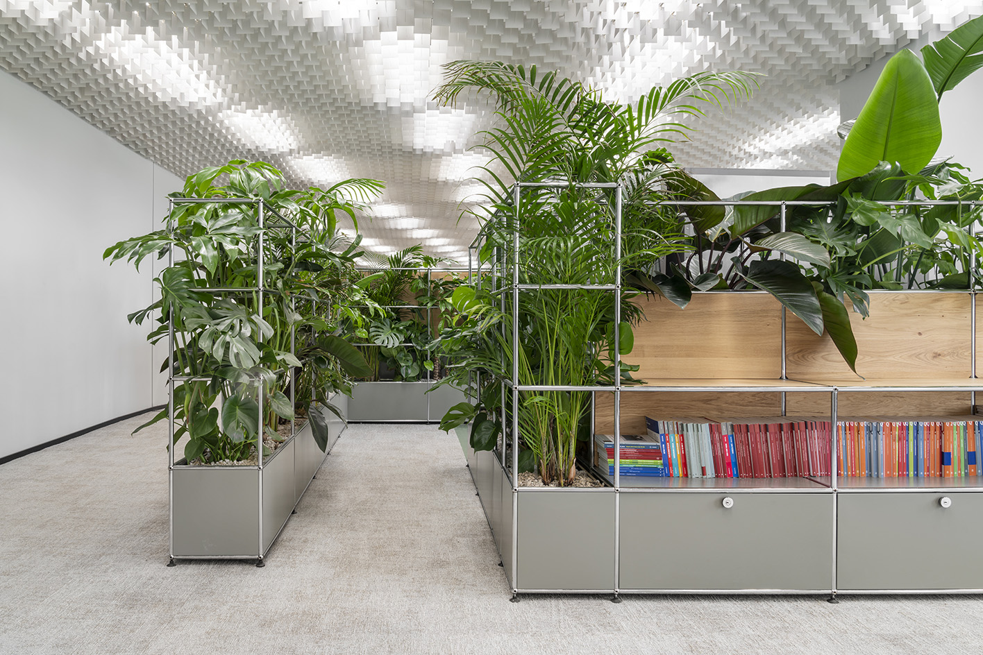 Palazzo Mondadori, modernist space originally designed by Oscar Niemeyer and seen here is the interior renovation by Carlo Ratti using recycled usm shelving