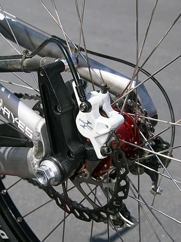 A floating rear brake mount should help keep the rear wheel firmly planted.