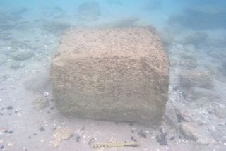 The stone slab, dating to the second century, was found underwater at Tel Dor, south of the city of Haifa.