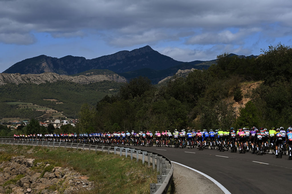 ARINSAL, SPAIN - AUGUST 28: A general view of the peloton competing during the 78th Tour of Spain 2023, Stage 3 a 158.5km stage from Súria to Arinsal 1911m/ #UCIWT / on August 28, 2023 in Arinsal, Andorra. (Photo by Tim de Waele/Getty Images)