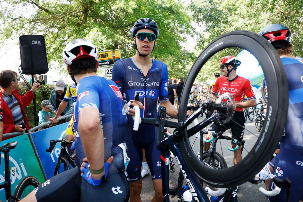 BILZEN BELGIUM AUGUST 27 Kevin Geniets of Luxembourg and Team GroupamaFDJ and the peloton stopped at the finish line to protest as riders deem the course as being too dangerous during the 19th Renewi Tour 2023 Stage 5 a 1873km stage from Riemst to Bilzen UCIWT on August 27 2023 in Bilzen Belgium Photo by Bas CzerwinskiGetty Images