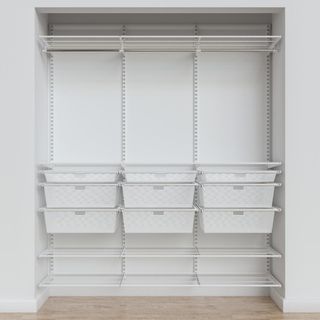 Reach in closet in White with multiple storage solutions