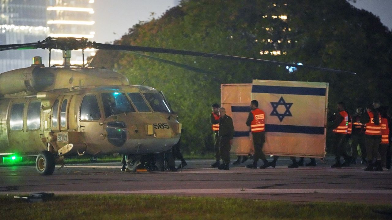 A helicopter arrives with freed Israeli hostages