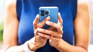 Woman holding iPhone
