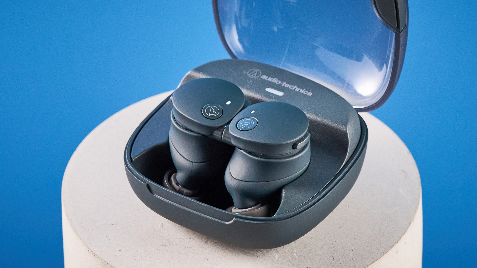 Audio-Technica ATH-CKS50TW2 in black colorway photographed ona blue background