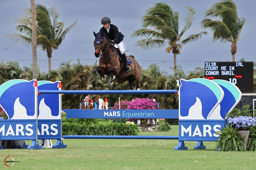 Conor Swail wins the CSI4* grand prix at WEF riding the 16-year-old gelding Count Me In