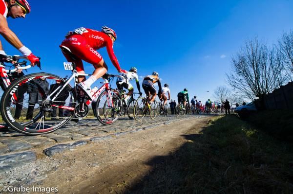 Belgian's Jan Ghyselinck (Cofidis) keeps in contact with the peloton as they tackle another stretch of cobbles