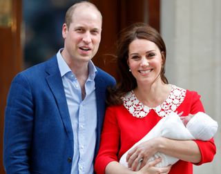 Prince William, Duke of Cambridge and Catherine, Duchess of Cambridge depart the Lindo Wing of St Mary's Hospital with their newborn baby son