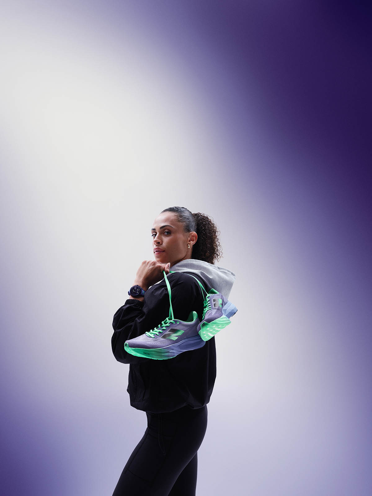 Sydney McLaughlin Levrone in the TAG Heuer x New Balance campaign wearing the collection&#039;s connected watch and sneakers.