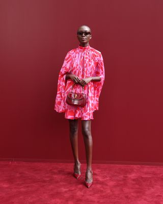 Amina Seck attends the Gucci show