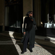 Franny fyne wears an all black outfit