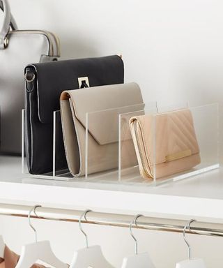 A purse organizer shelf divider