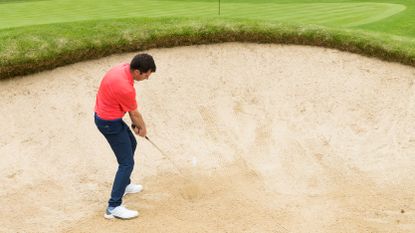 PGA pro Dan Grieve hitting a bunker shot at Woburn