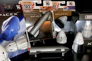 The Mattel Matchbox SpaceX releases to date, including mainline (at left) and collector edition (at right) Dragon spacecraft and Sky Busters Starship and Dragon descent capsule. The line is expected to grow with a Sky Busters Falcon Heavy rocket in 2024.