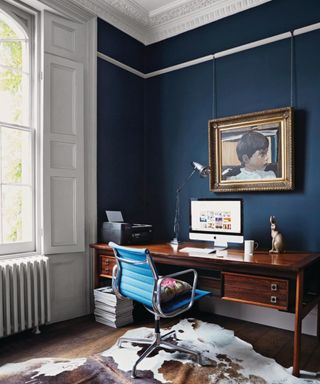 home office with navy walls
